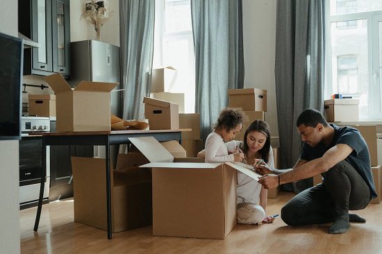 A family unpacking after a successful house move